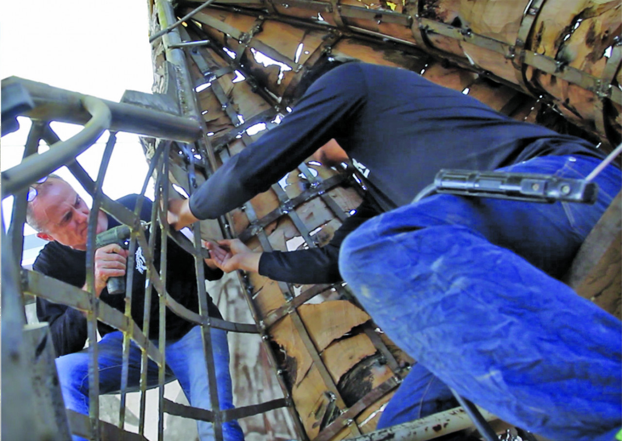 Attaching the first layer of wood to the wing