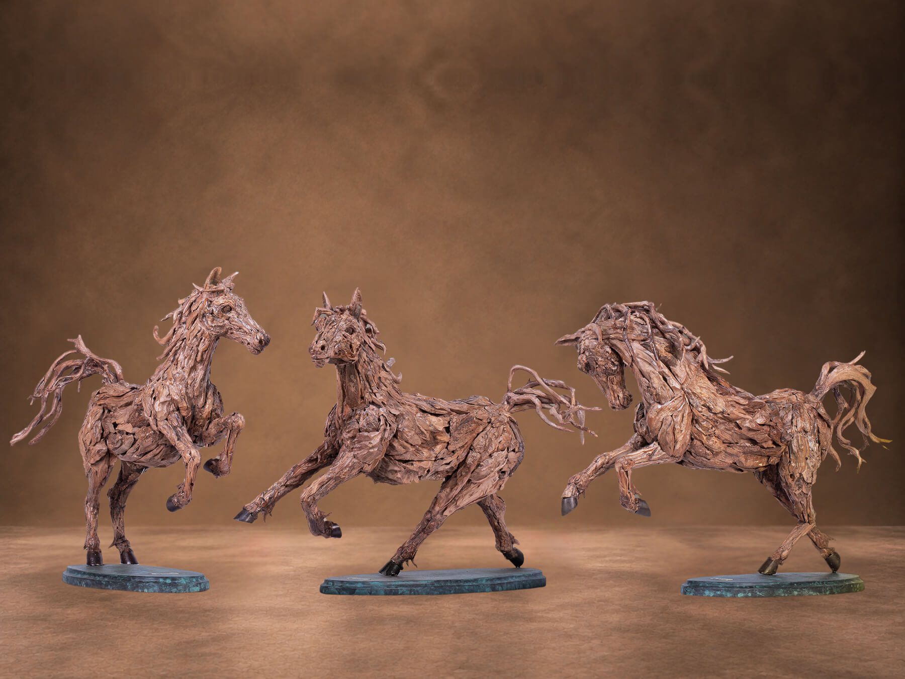 Maquettes of Symphony, Unbridled and Vivace – driftwood horse sculptures by James Doran-Webb