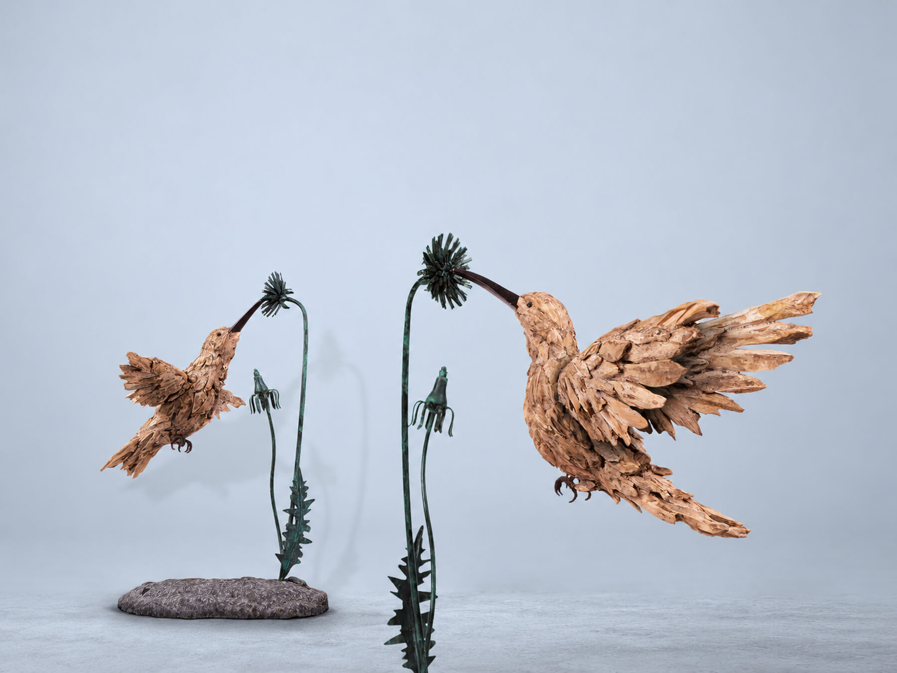 The Sunbird (left) and The Lucky Sunbird (right) – driftwood sculptures by James Doran-Webb